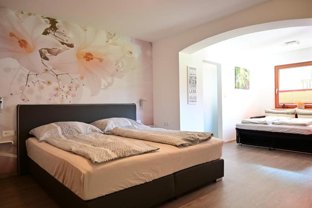 Postel nebo postele na pokoji v ubytování Appartement Wanneck