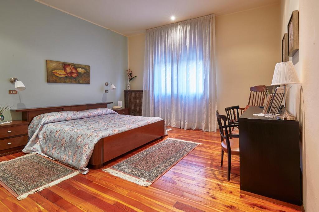 Postel nebo postele na pokoji v ubytování ALBERGO EUROPA