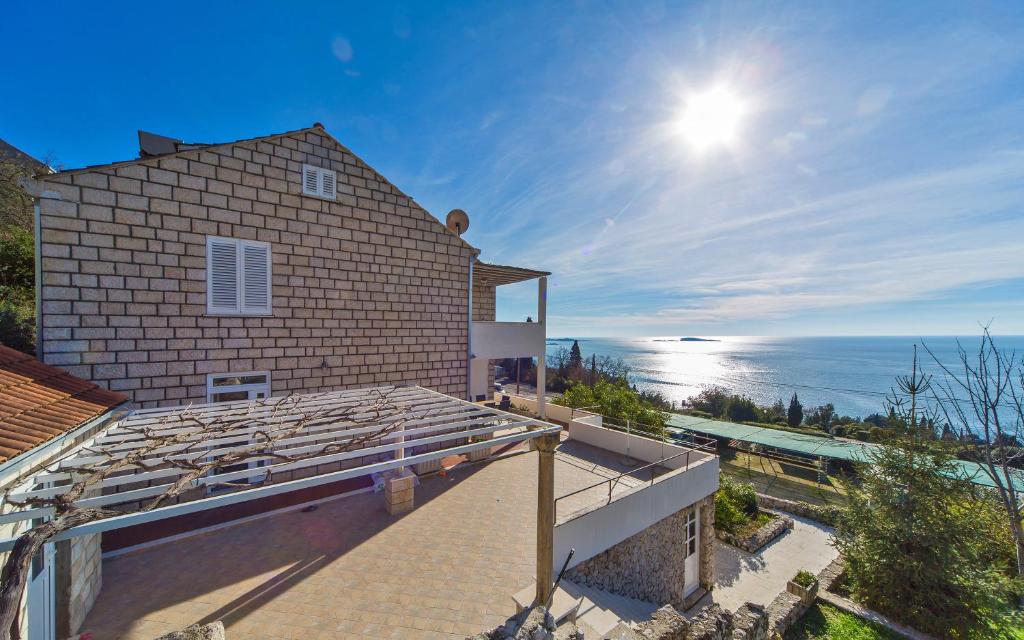 a view of the ocean from the roof of a house at Villa Narona in Mlini