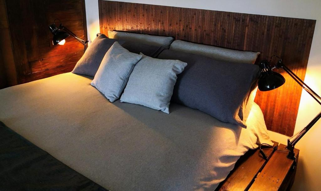 Postel nebo postele na pokoji v ubytování appartment & rooms SecondoPiano