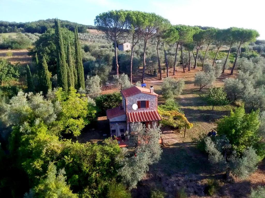 an aerial view of a house in a forest at Ferienhaus IL-PINO in Roccastrada