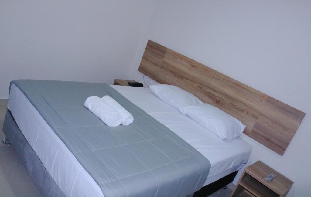 Postel nebo postele na pokoji v ubytování Hotel Kusnaya