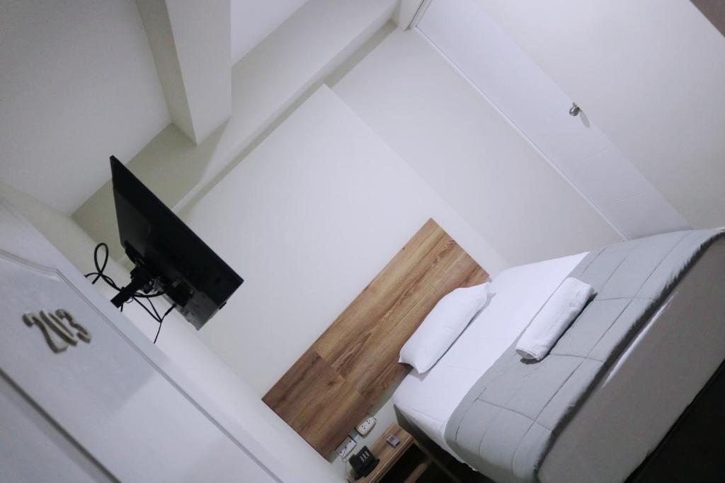 Postel nebo postele na pokoji v ubytování Hotel Kusnaya