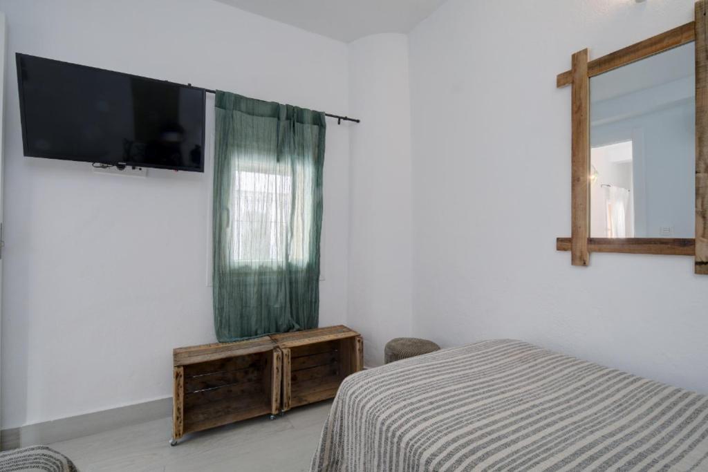 Postel nebo postele na pokoji v ubytování Casita Bonita Old Town Marbella