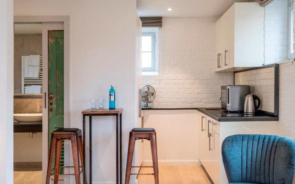 Kuchyň nebo kuchyňský kout v ubytování Hotel Oderberger