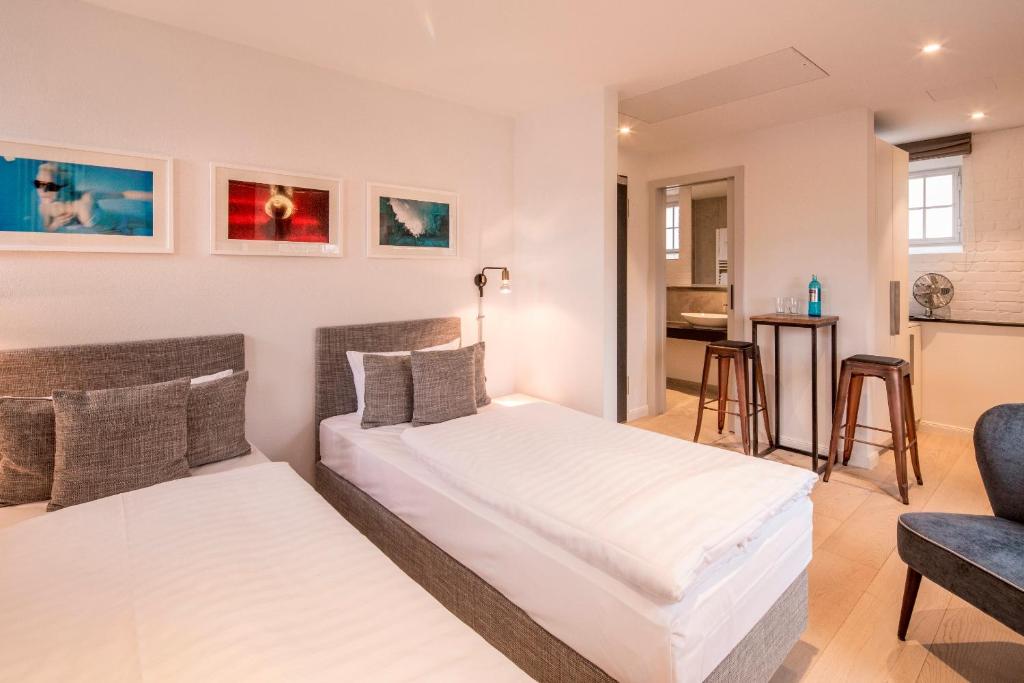Postel nebo postele na pokoji v ubytování Hotel Oderberger