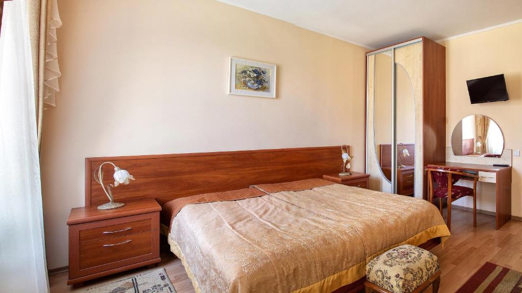 Postel nebo postele na pokoji v ubytování Villa Marta