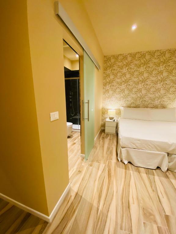 Posteľ alebo postele v izbe v ubytovaní Harmony House Prestige