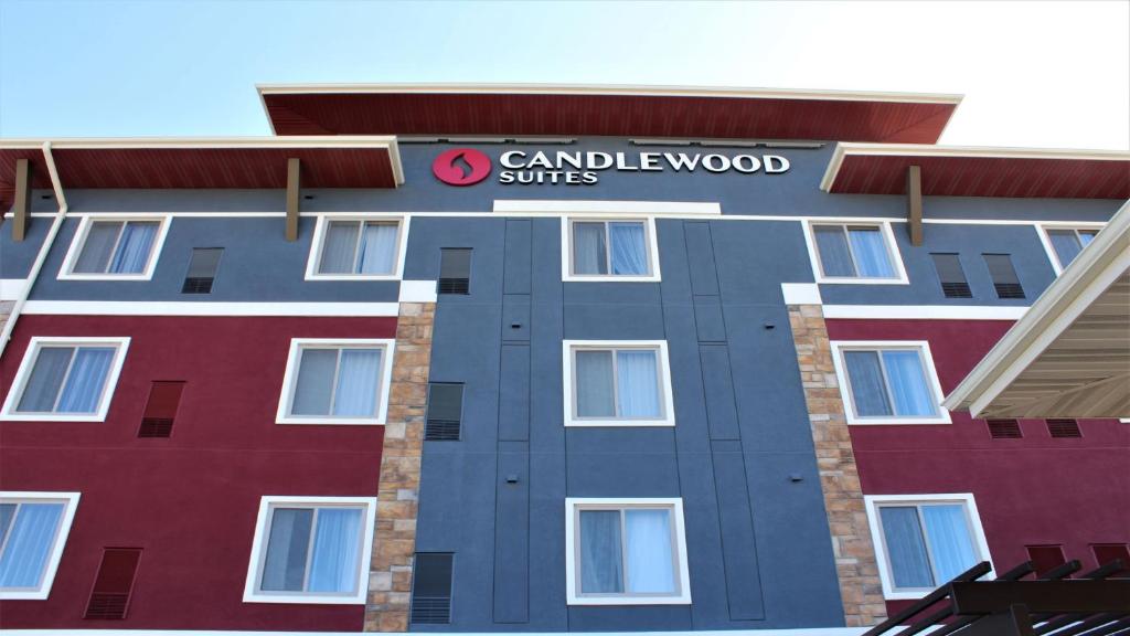 a building with a sign that reads campbellwood suites at Candlewood Suites Fargo South-Medical Center, an IHG Hotel in Fargo