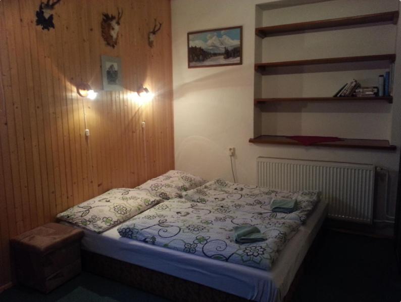 Postel nebo postele na pokoji v ubytování Rodinný penzion Ždiaran
