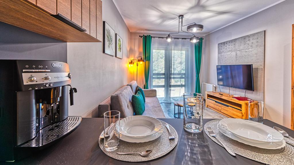 Кухня или кухненски бокс в Apartament Studio Holiday Mountain Residence - 5D Apartamenty