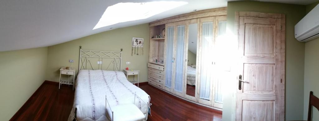 Posteľ alebo postele v izbe v ubytovaní Casa de Lela