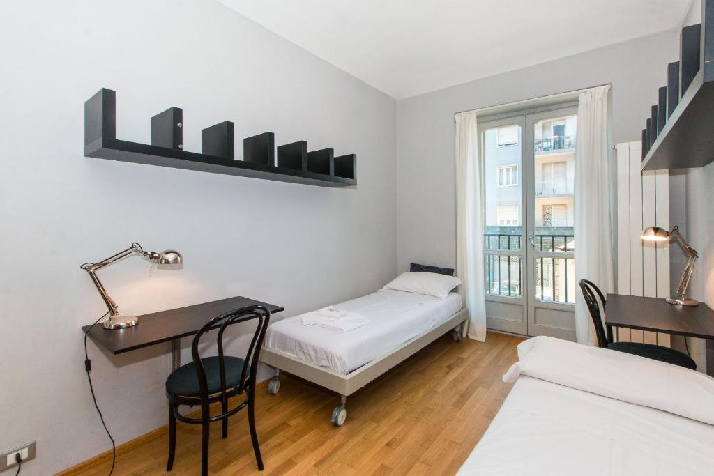 Postel nebo postele na pokoji v ubytování Parco del Valentino Cozy Flat with balcony