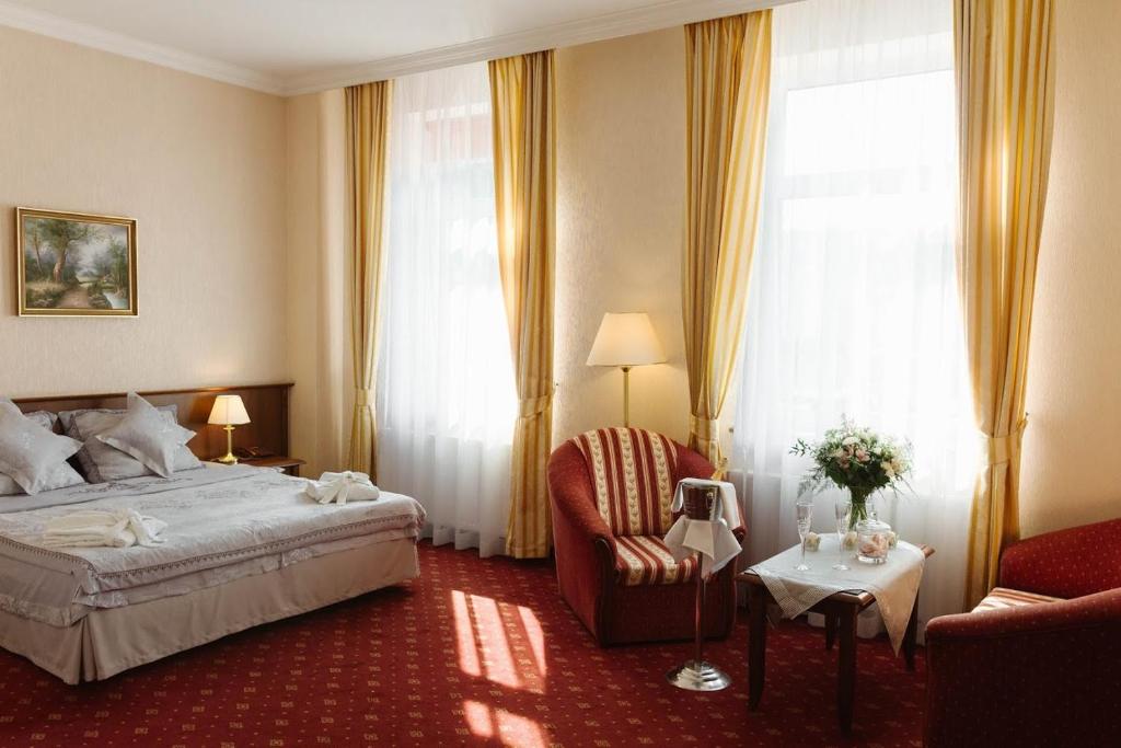 Posteľ alebo postele v izbe v ubytovaní Hotel Jakub Sobieski