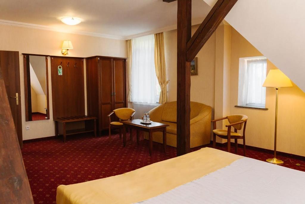 Posteľ alebo postele v izbe v ubytovaní Hotel Jakub Sobieski