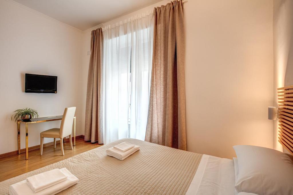 Postel nebo postele na pokoji v ubytování Hotel King