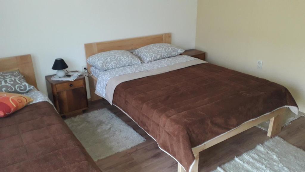 Postel nebo postele na pokoji v ubytování Apartment Sijakovic