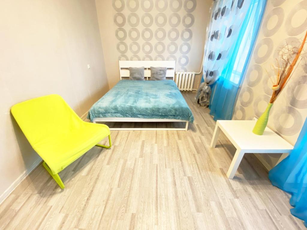 Ένα ή περισσότερα κρεβάτια σε δωμάτιο στο Apartment Levchenko 8