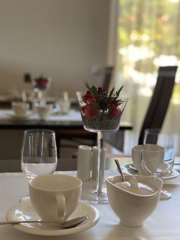 Příslušenství pro přípravu čaje a kávy v ubytování Hotel Garni Toscanina - Adults Only