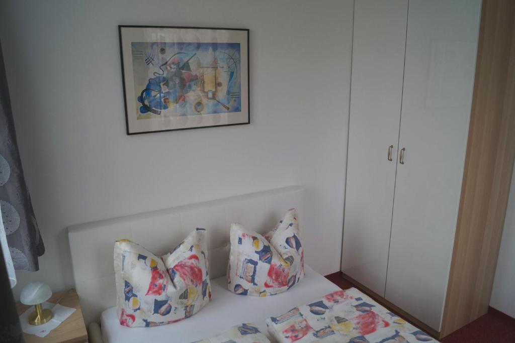 Łóżko lub łóżka w pokoju w obiekcie Ferienwohnung Sonnwendhof "Kellerjochblick"