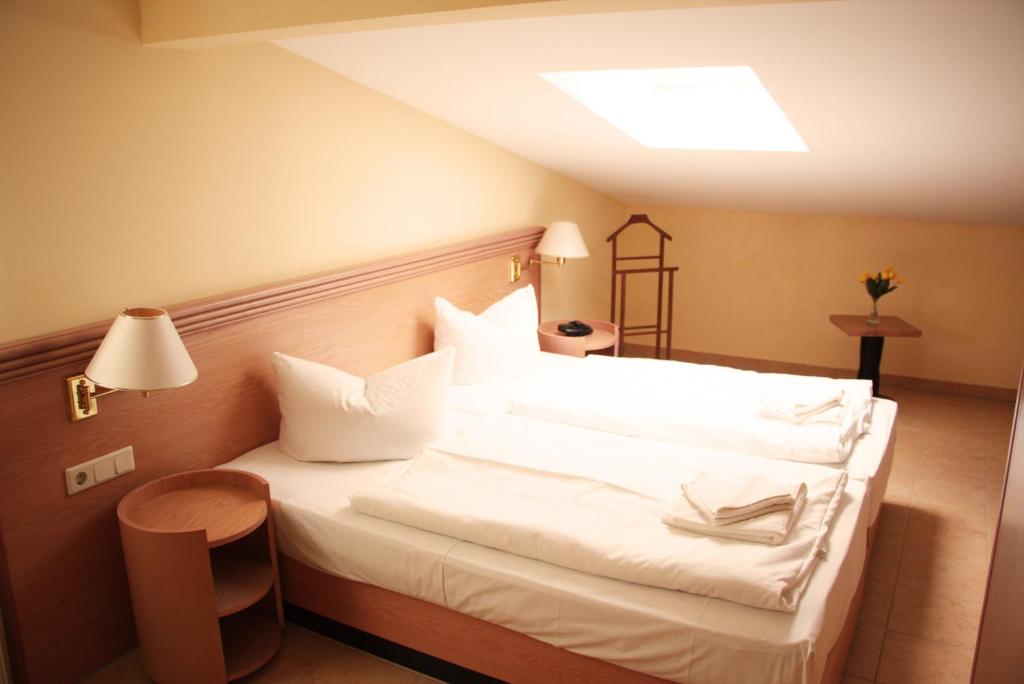 Postel nebo postele na pokoji v ubytování Hotel Esplanade & Aparthotel Rialto