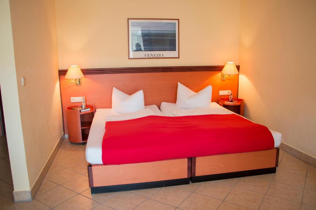 Postel nebo postele na pokoji v ubytování Hotel Esplanade & Aparthotel Rialto