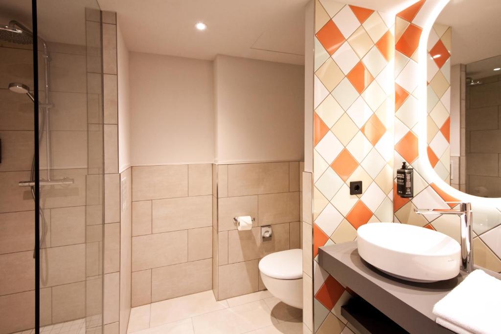 Vannituba majutusasutuses ibis Styles Klagenfurt am Woerthersee