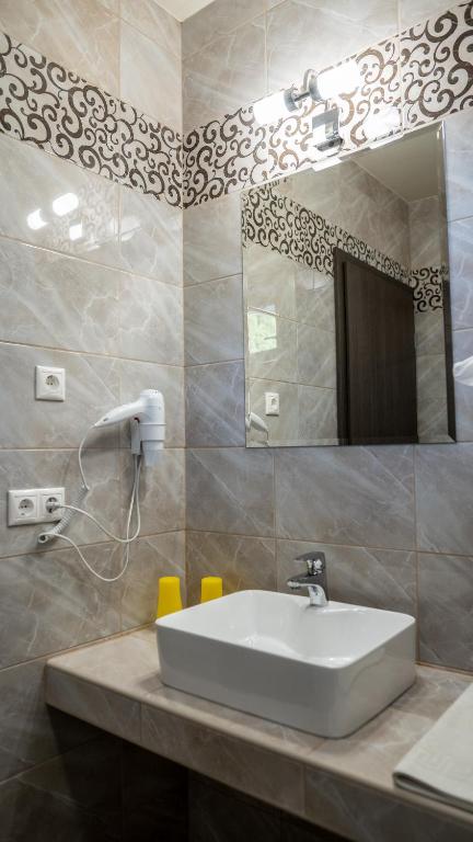 Koupelna v ubytování Főnix Apartman