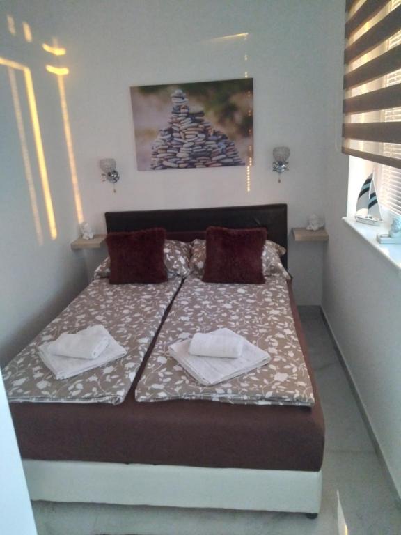 Postelja oz. postelje v sobi nastanitve Apartman Deluxe