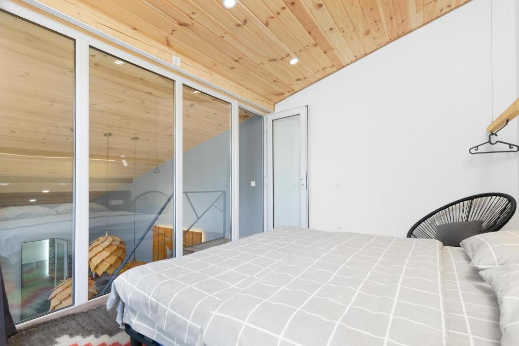 Postel nebo postele na pokoji v ubytování Cottage RoKSa 2