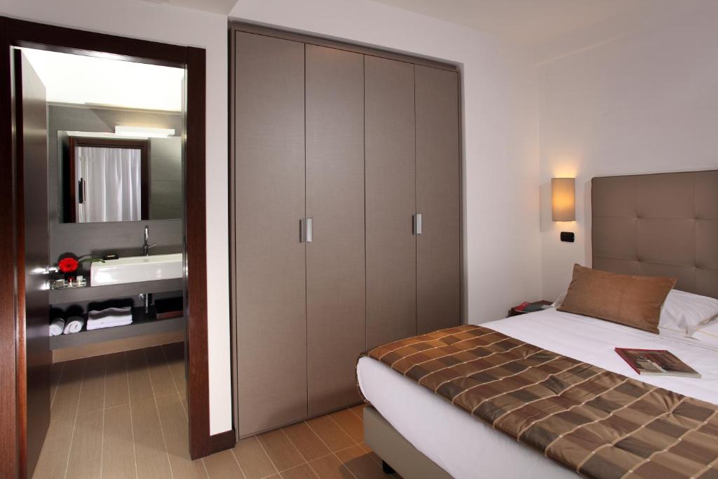 Postel nebo postele na pokoji v ubytování Residence Hotel Parioli