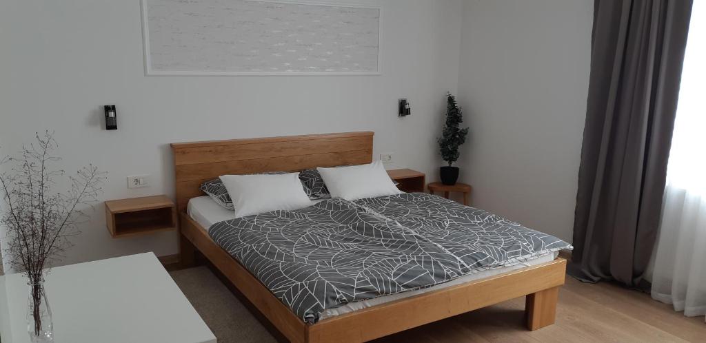 Postel nebo postele na pokoji v ubytování Apartments Woodnotes