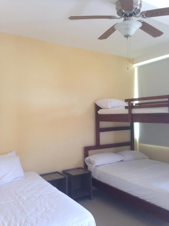 Postel nebo postele na pokoji v ubytování Casa y Mar Hotel