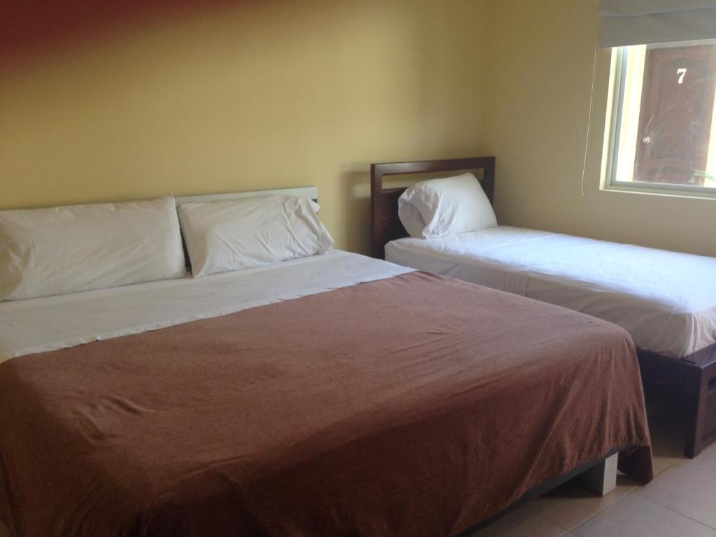 Postel nebo postele na pokoji v ubytování Casa y Mar Hotel