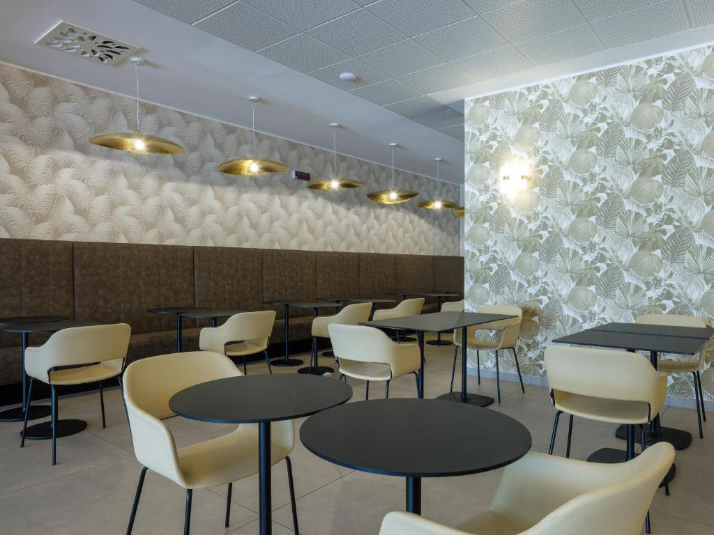 Restaurace v ubytování Hotel Leonardo Da Vinci