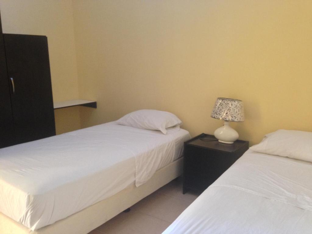 Postel nebo postele na pokoji v ubytování Casa y Mar Hotel