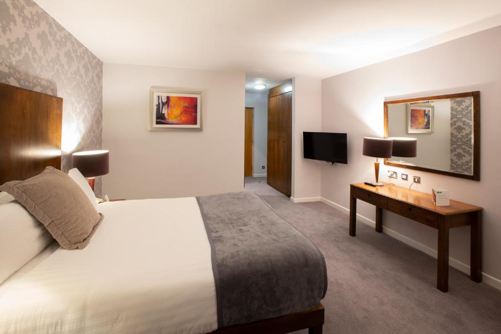 TV a/nebo společenská místnost v ubytování Hotel Kilkenny