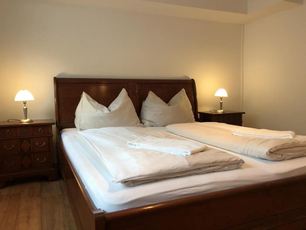 Posteľ alebo postele v izbe v ubytovaní CityApartment MELITTA