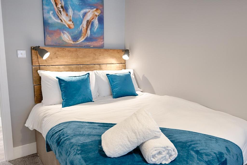 Ένα ή περισσότερα κρεβάτια σε δωμάτιο στο Murray Nest #1 - TV in Every Bedroom!