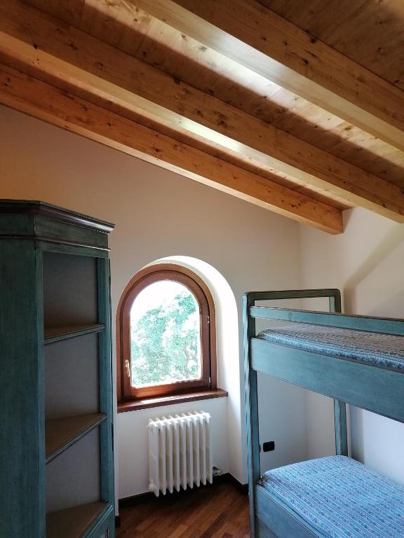 Postel nebo postele na pokoji v ubytování Villa Daniela