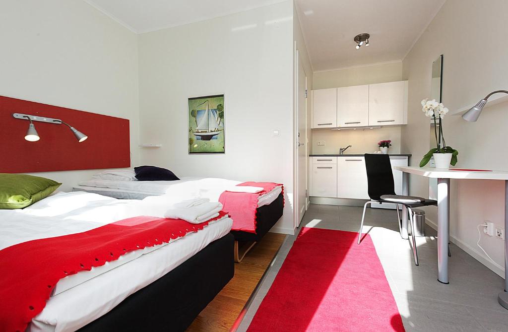 Postel nebo postele na pokoji v ubytování EttSmart Hotell