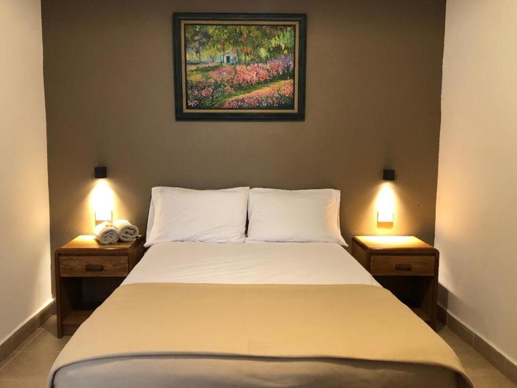 Postel nebo postele na pokoji v ubytování Hostel Inn