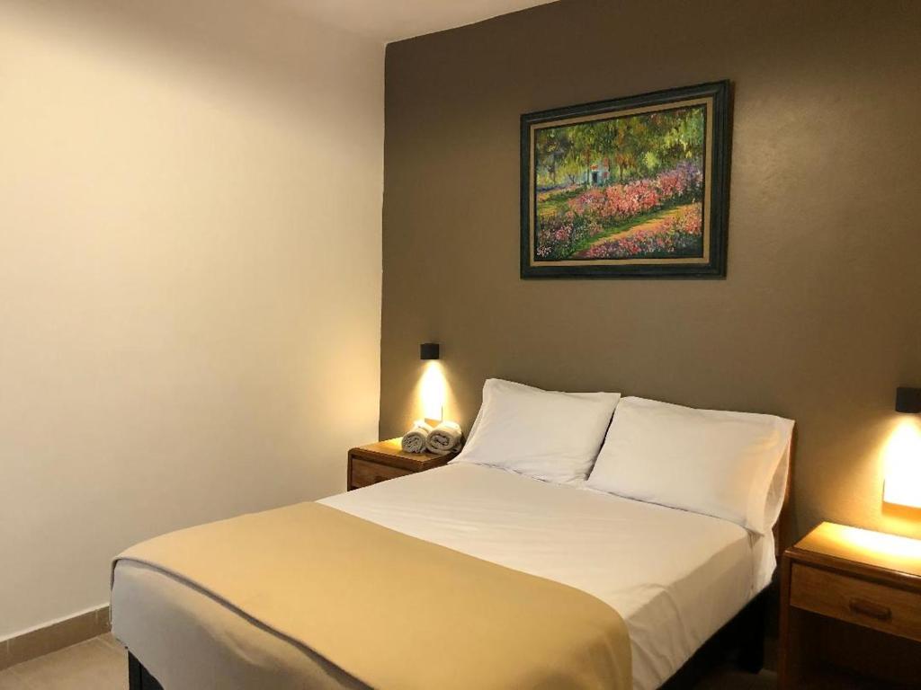 Postel nebo postele na pokoji v ubytování Hostel Inn