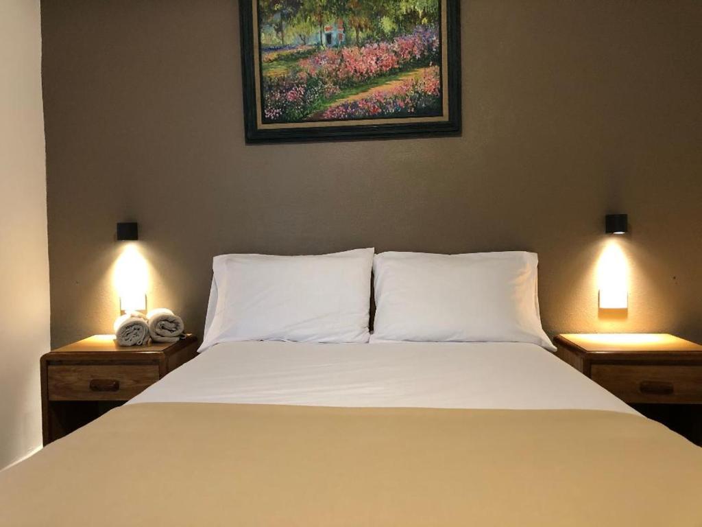 Postel nebo postele na pokoji v ubytování Hostel Inn