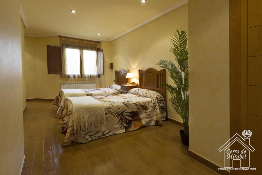 Postel nebo postele na pokoji v ubytování Casa Rural Cerro de Mirabel