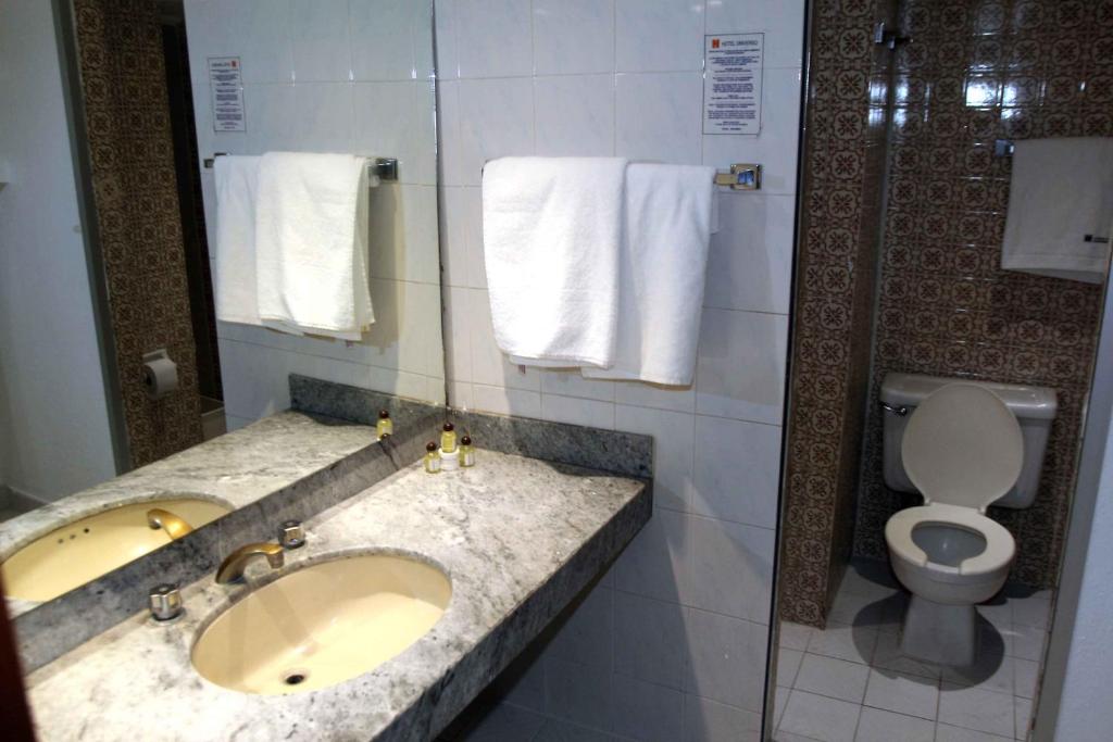 Koupelna v ubytování Hotel Universo