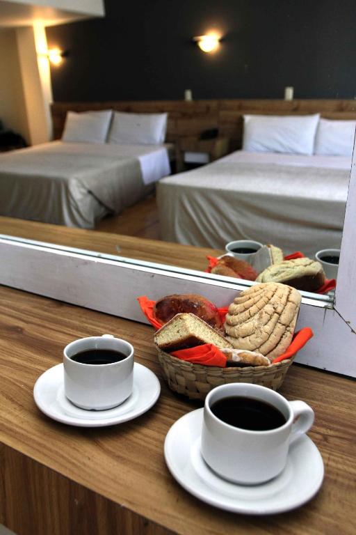 Postel nebo postele na pokoji v ubytování Hotel Universo