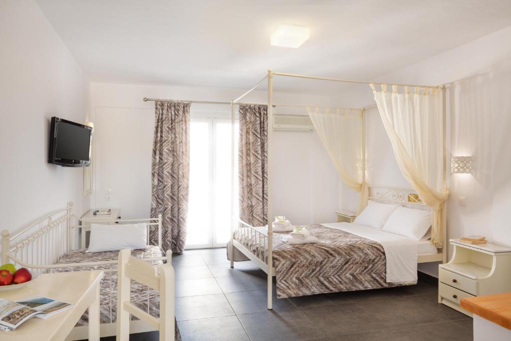 Postel nebo postele na pokoji v ubytování Sea View Beach Hotel