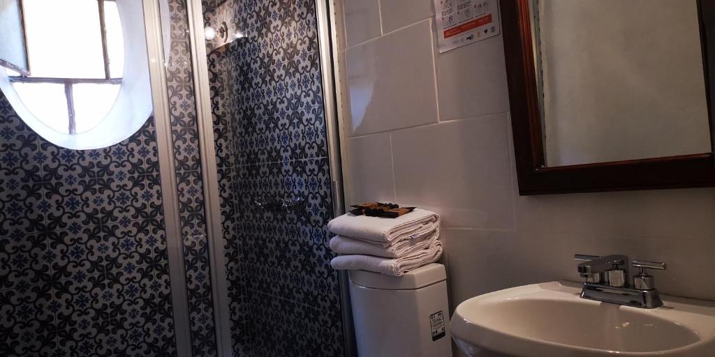 Koupelna v ubytování Hotel Sautto