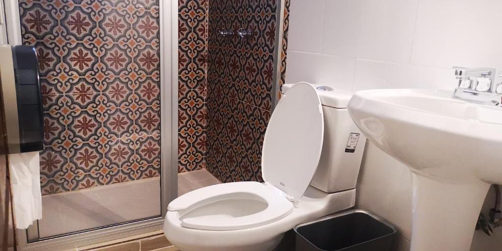 Koupelna v ubytování Hotel Sautto